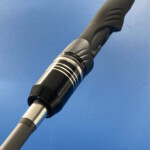 Custom fishing rod reel seat and foregrip detail with carbon insert and alloy trim