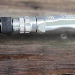 Close-up of K-Labs custom rod handle with premium machined reel seat and EVA grips